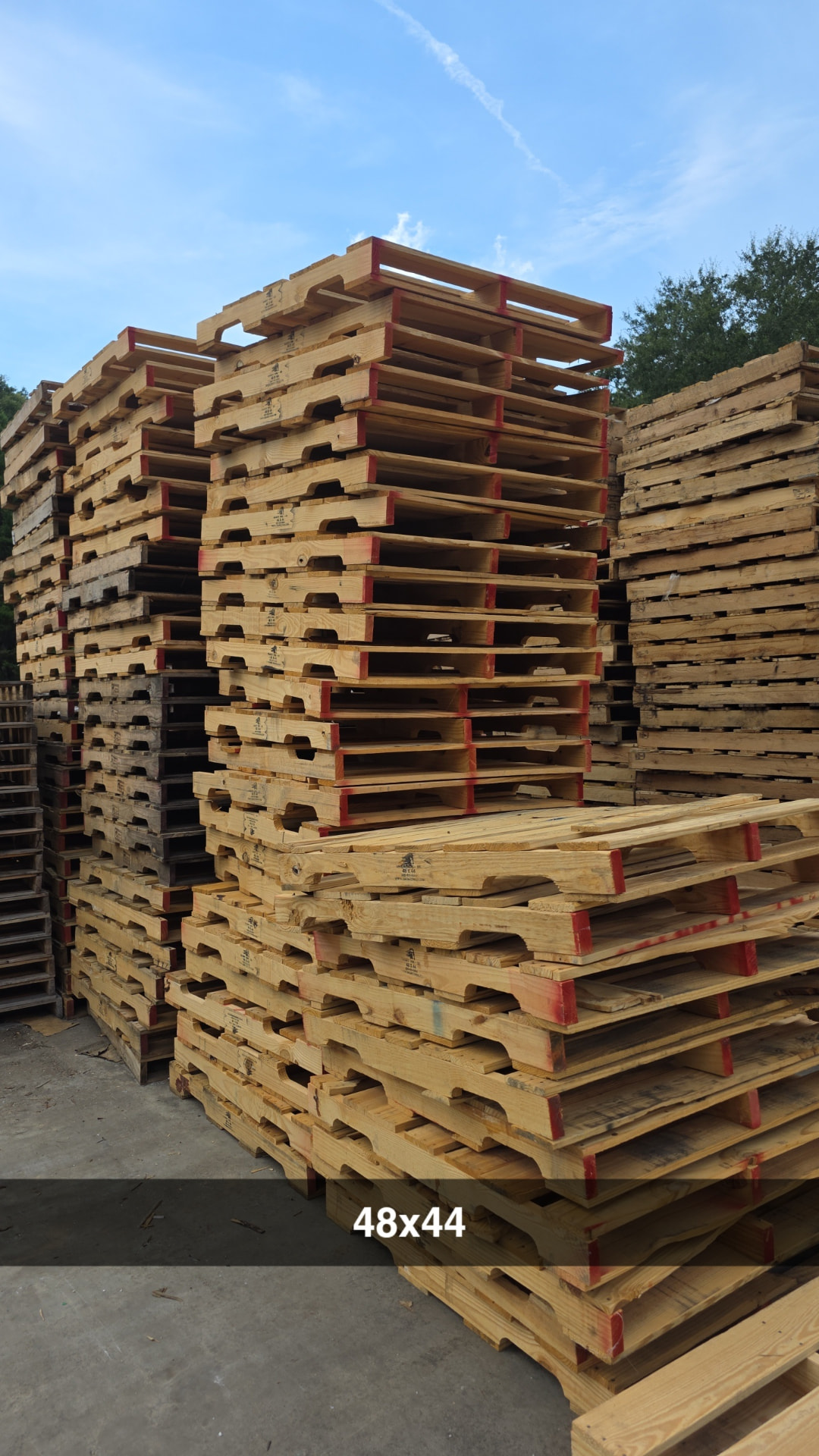 Stacks of specialty pallets used for custom-size pallet builds